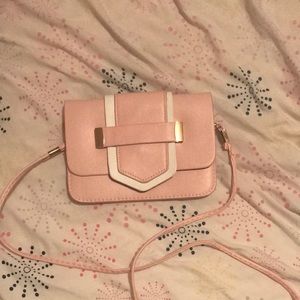Pink and white crossbody wallet bag